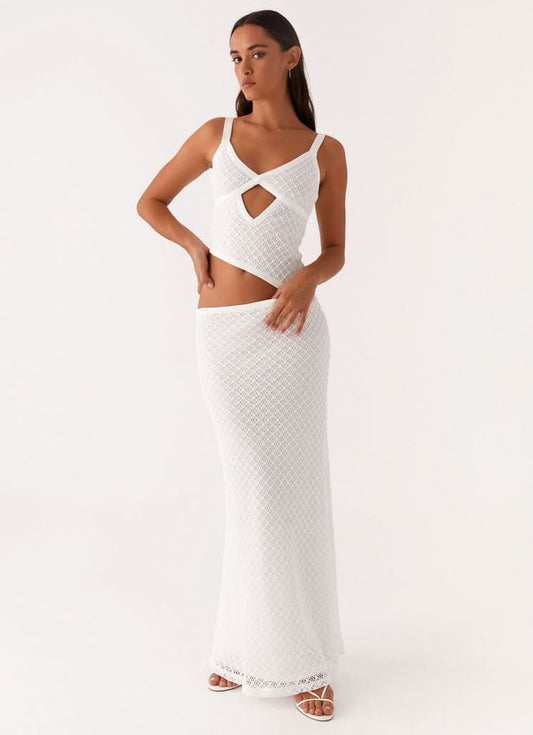 White textured maxi dress with cutout front and crisscross straps