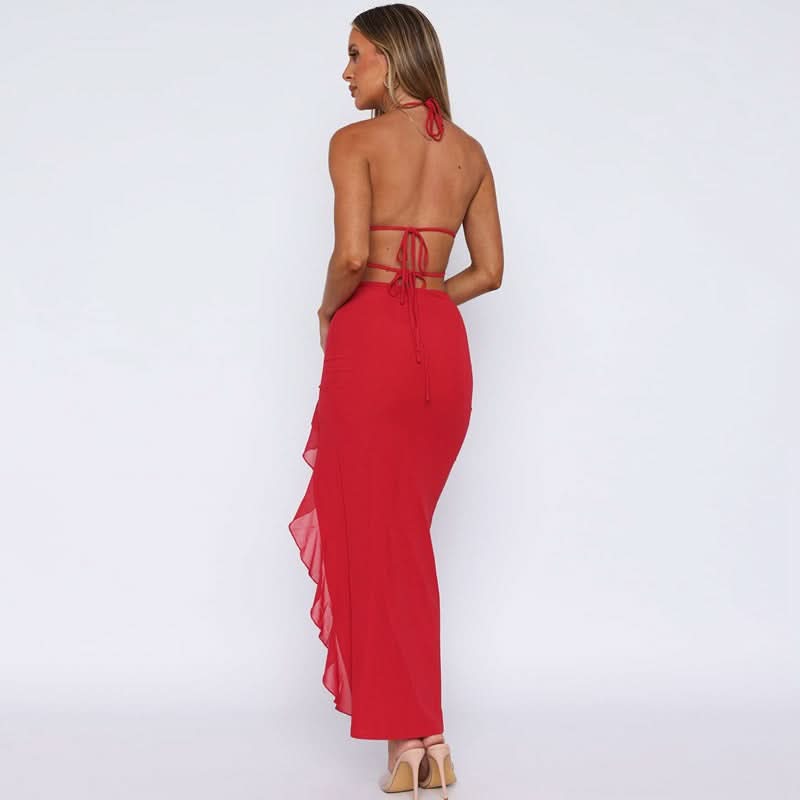 Back view of red maxi dress showing open back straps and ruffled hem