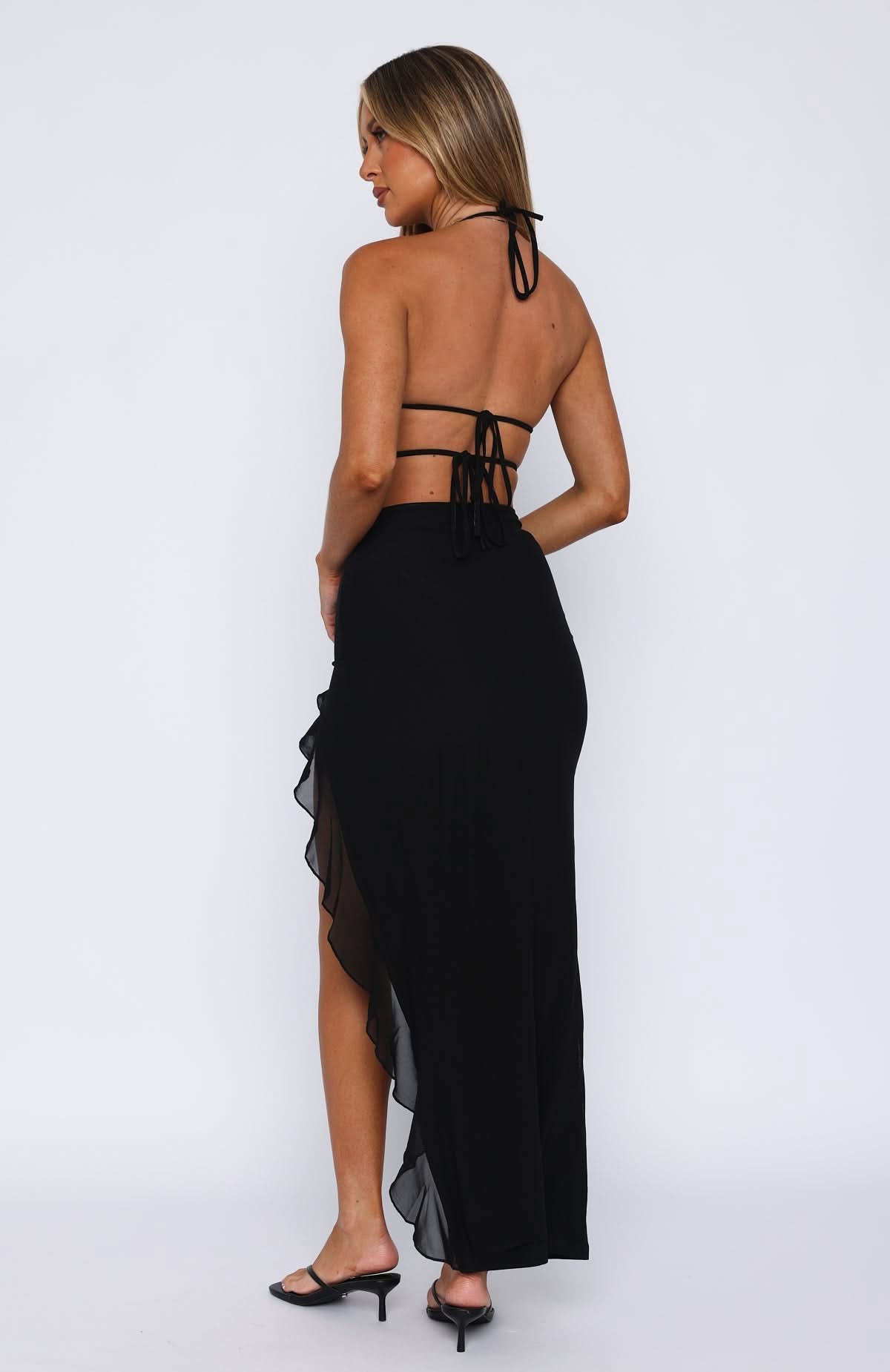 Back view of black maxi dress with lace-up back straps