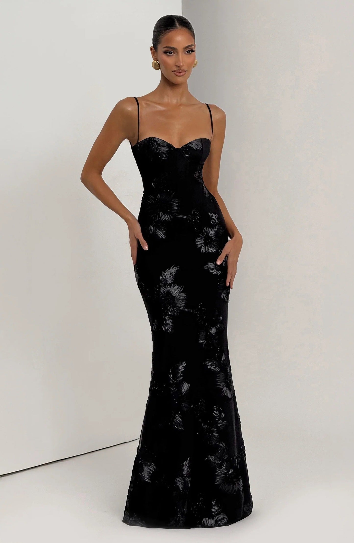 Black floral corset maxi dress with sweetheart neckline and spaghetti straps