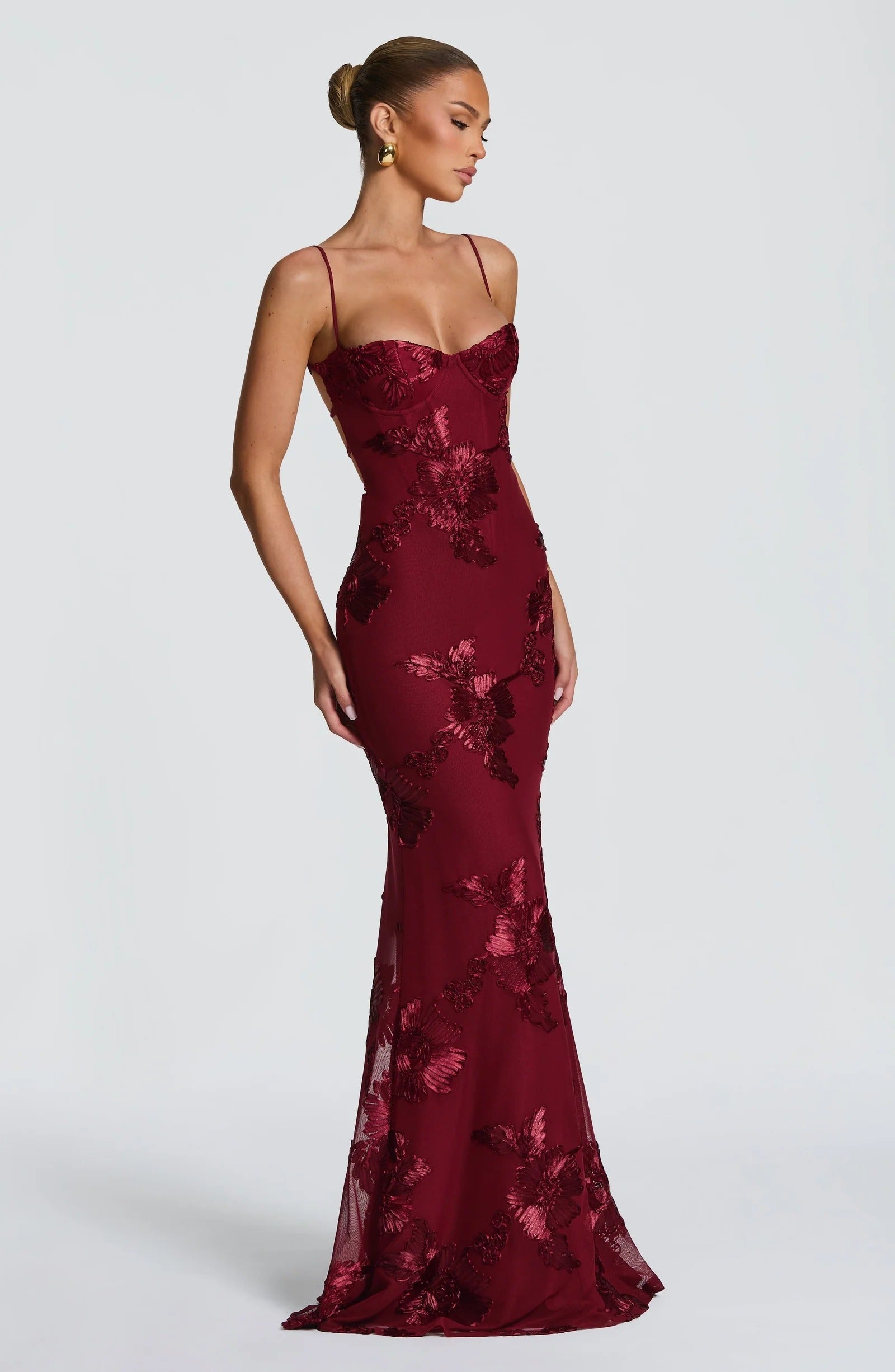 Burgundy floral corset maxi dress side view with spaghetti straps