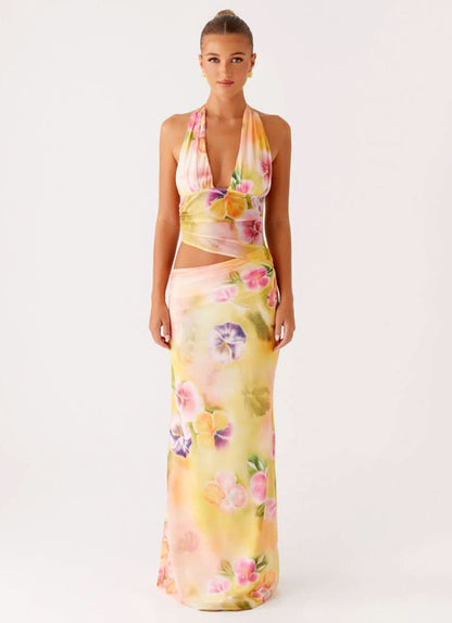 Front view of halter midi dress with wrapped waist and multicolor floral design