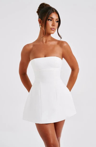 White strapless mini dress back view with center seam detail