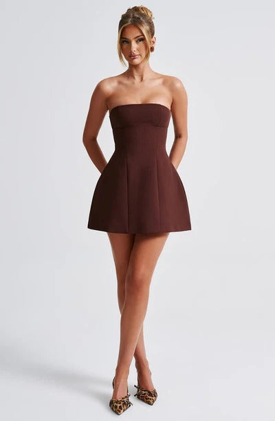 Deep burgundy strapless mini dress with fitted waist and flared hem