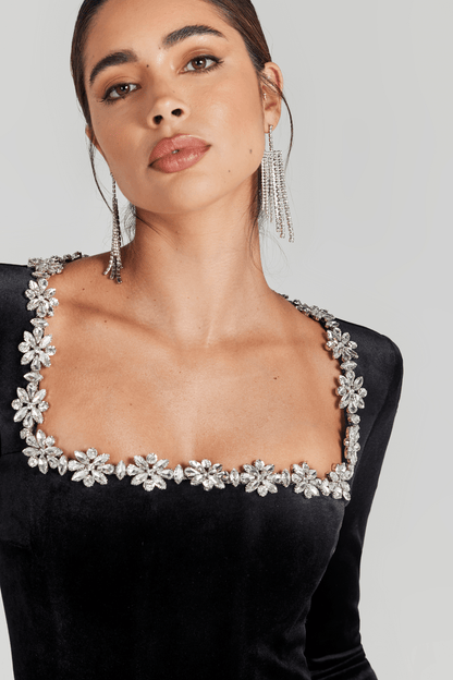 Black velvet jumpsuit shoulder and neckline with sparkling crystal embellishment