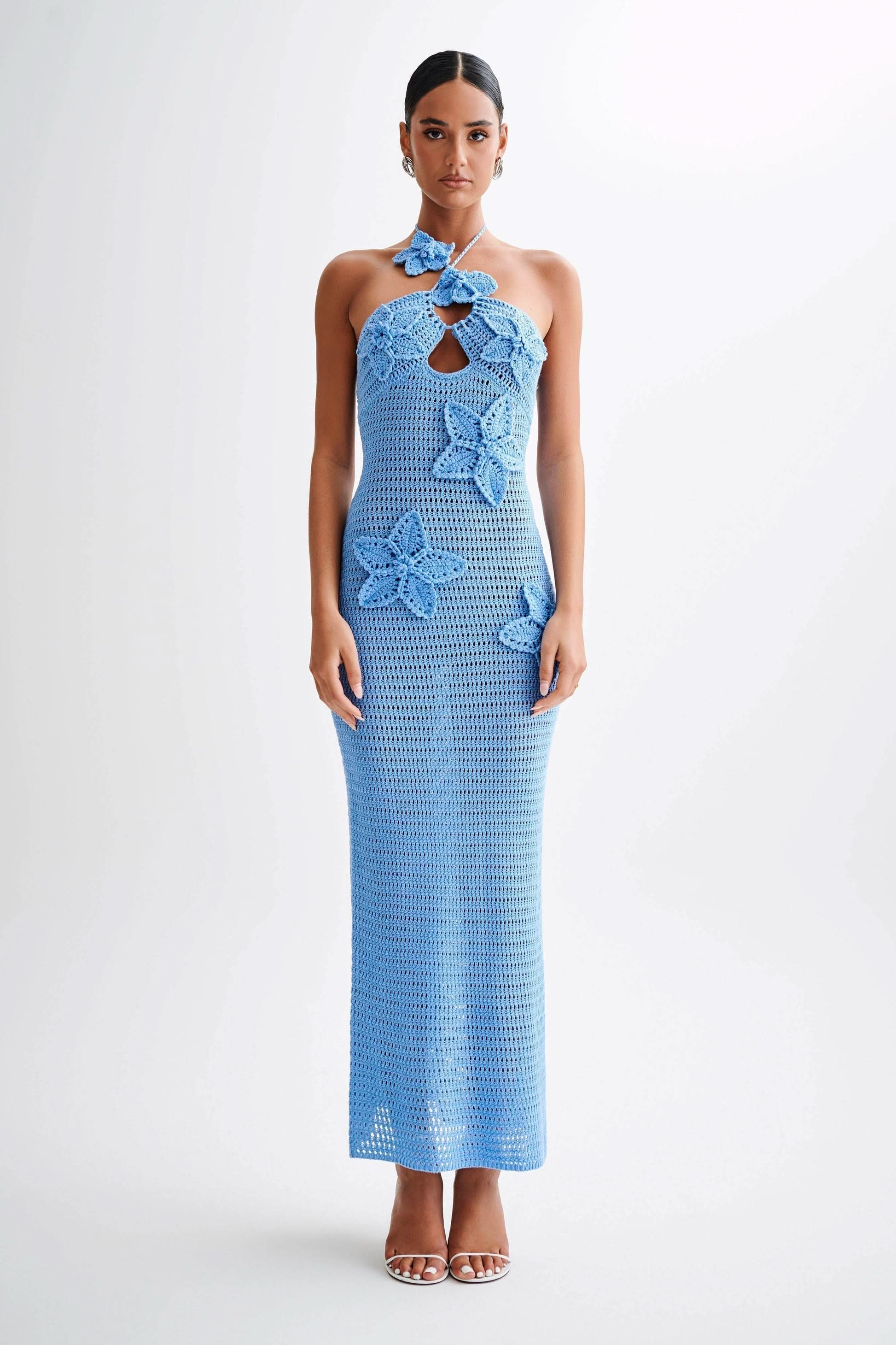 Blue crochet maxi dress with white butterfly appliqués and halter neck