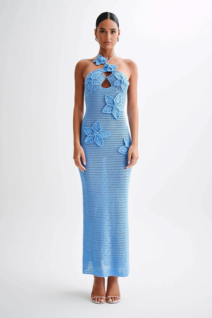 Blue crochet maxi dress with white butterfly appliqués and halter neck