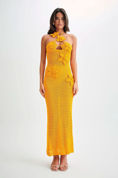 Golden yellow crochet maxi dress with halter neckline and decorative butterfly appliqués