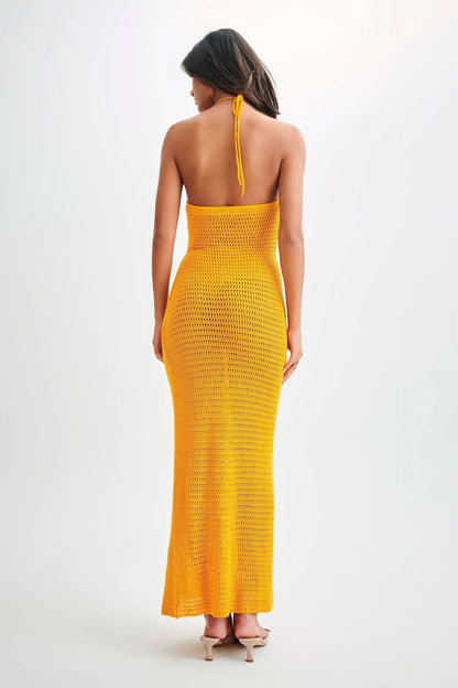 Back view of golden yellow crochet maxi dress with halter tie
