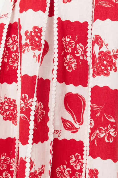 Red and white floral maxi dress with scalloped trim detail