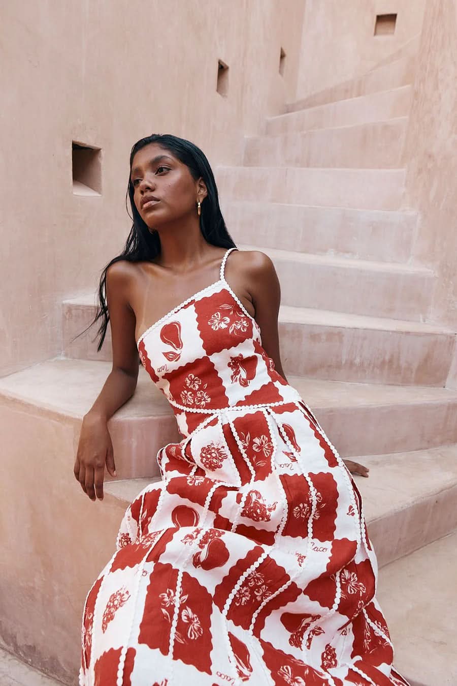 Sleeveless maxi dress in red and white with wrapped bodice detail