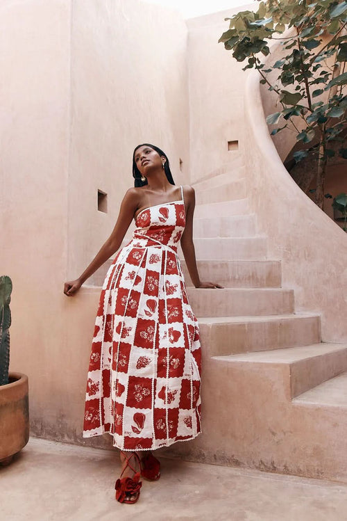 Red and white patchwork maxi dress with floral print and pearl trim