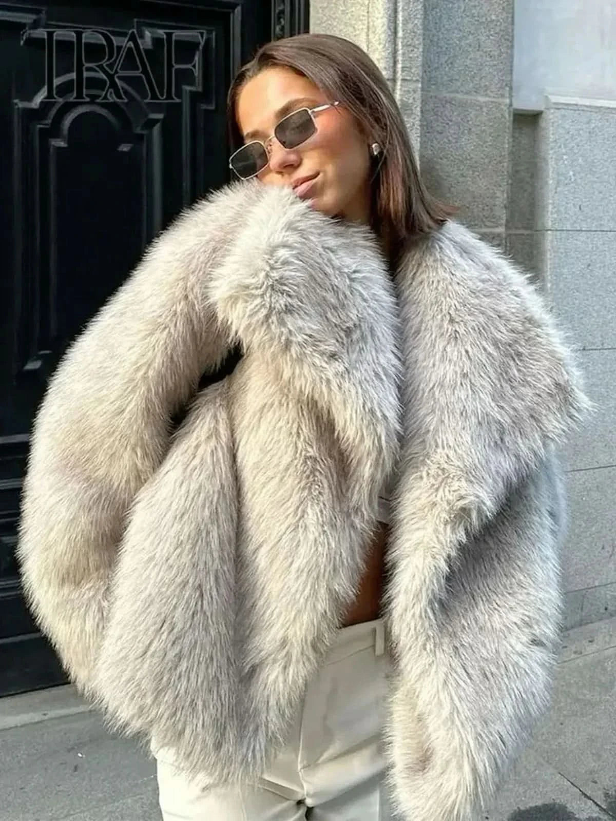 Light gray faux fur coat with thick collar and cuffs, front view