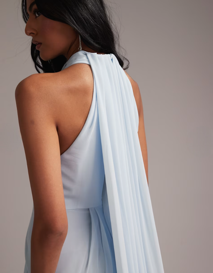 Blue maxi dress back view showing open cape-like chiffon draping detail