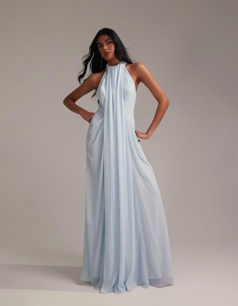 Front three-quarter view of blue chiffon maxi dress with fitted halter bodice