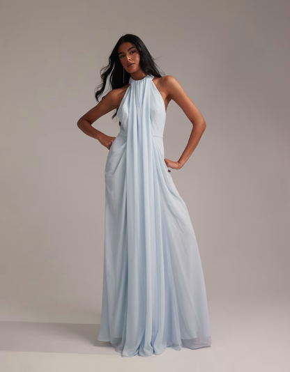 Front three-quarter view of blue chiffon maxi dress with fitted halter bodice
