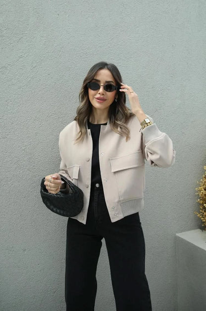 Cream white bomber jacket with cargo pockets and ribbed trim