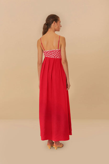 Back view of red maxi dress with fish embroidery and spaghetti straps