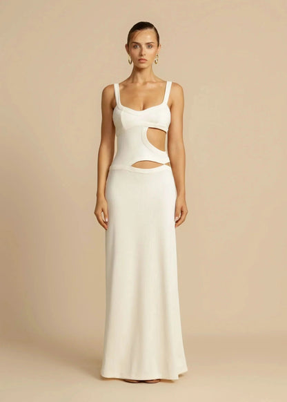 White maxi dress with side cutouts and fitted silhouette, front