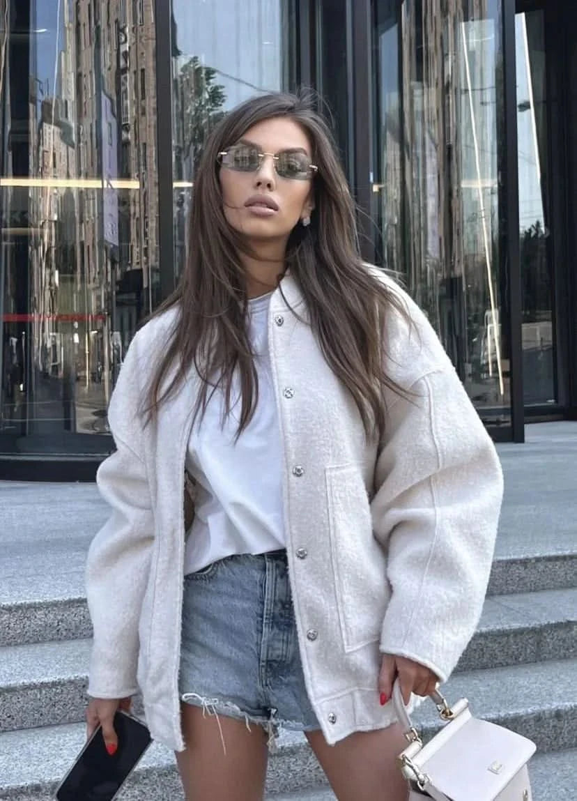 Beige linen bomber jacket with button front and structured shoulders