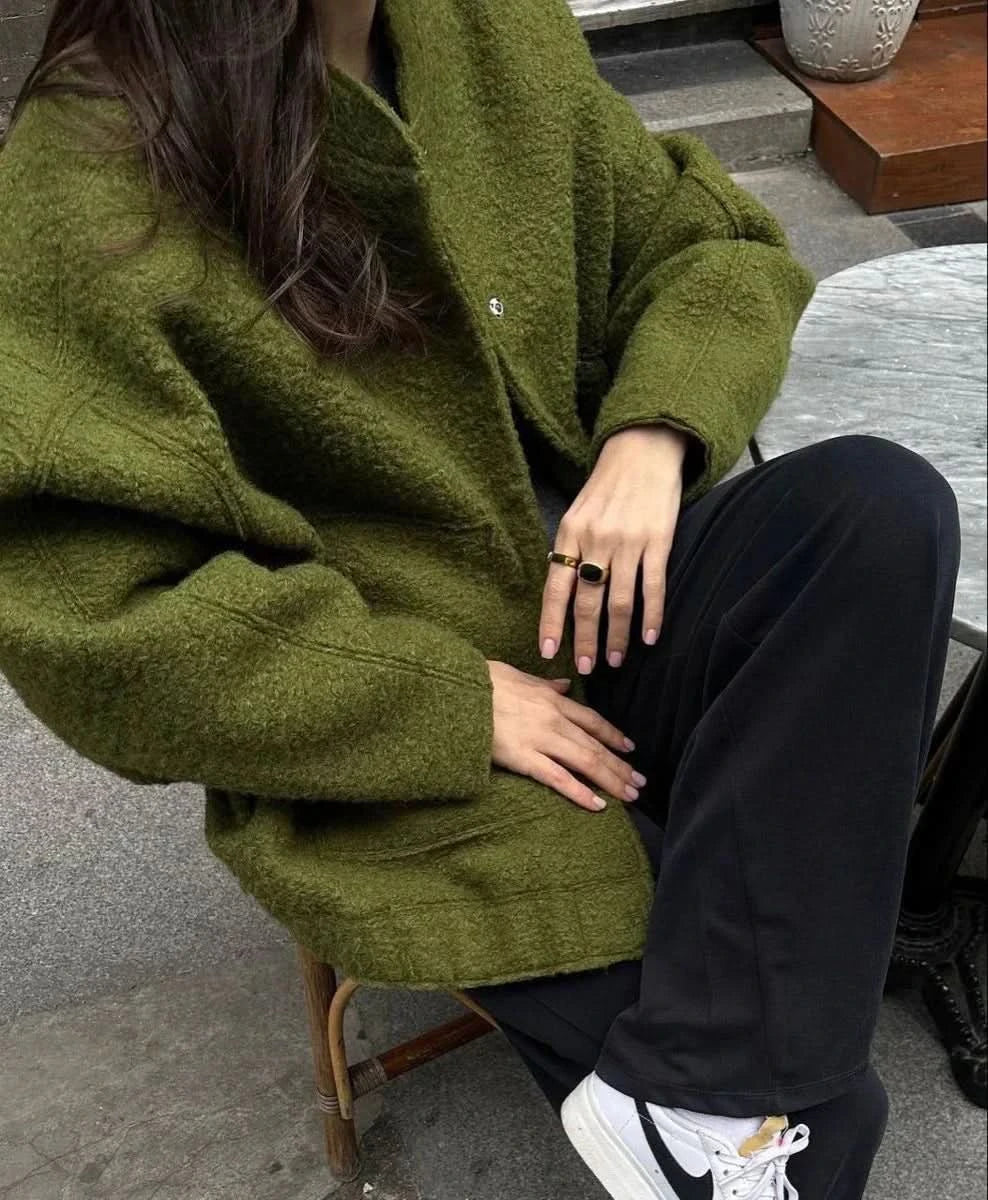 Gray heathered oversized bomber jacket styled with black wide-leg trousers