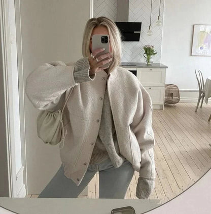 Cream white oversized bomber jacket with soft knit fabric and button details