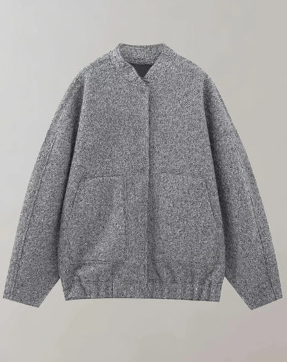 Gray speckled oversized bomber jacket flat lay with relaxed fit and textured weave