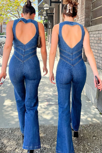 Blue denim jumpsuit with heart-shaped cutout back and chevron seaming detail
