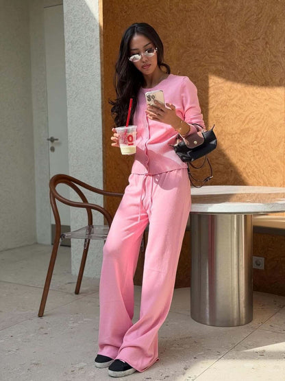 Pink ribbed knit set with long sleeves, relaxed fit pants and drawstring waist