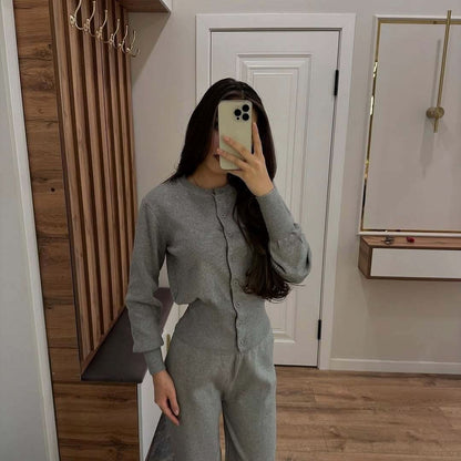 Gray ribbed knit set with button-front cardigan and straight-leg pants
