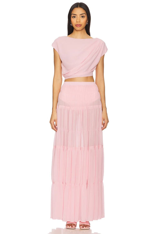 Pink pleated maxi summer set with draped crop top and tiered skirt for women