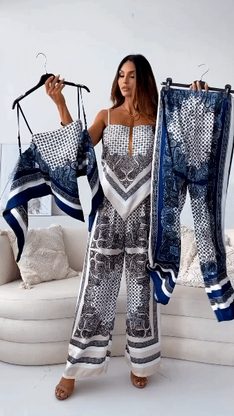 Navy bandana crop top and matching wide-leg pants displayed on hangers