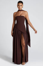 Brown strapless evening gown with diagonal pleated overlay and high slit
