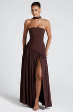 Brown halter maxi dress with ruched waist and asymmetrical draped skirt