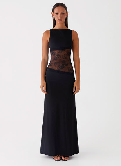 Black sleeveless maxi dress with sheer lace waist panel and solid bodice