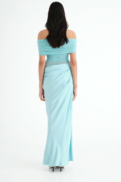 Back view of turquoise off-shoulder maxi dress with draped fabric