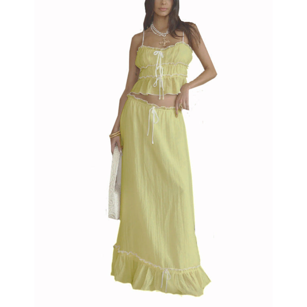 Yellow maxi skirt set with ruched crop top and ruffled hem detail on skirt