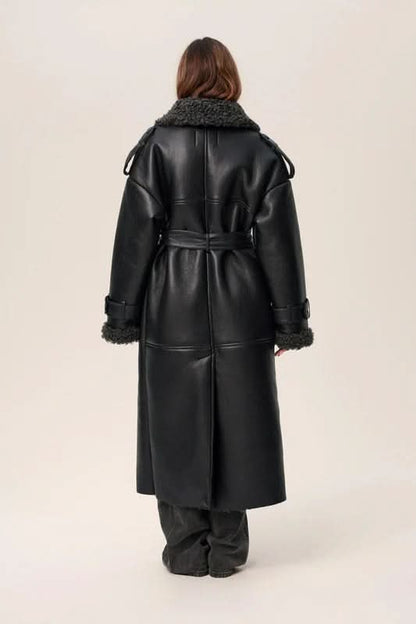 Back view of black leather cropped coat with charcoal fleece collar and sleeve cuffs