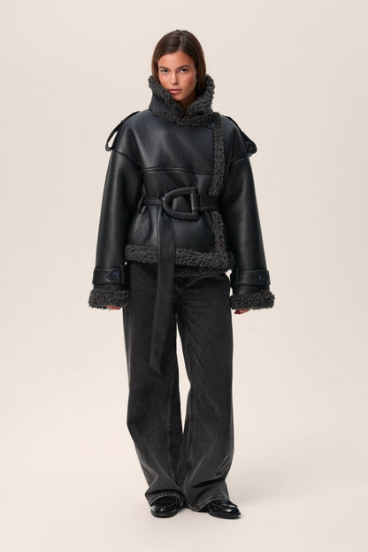 Black leather cropped coat with charcoal fleece trim and tie-neck detail, front