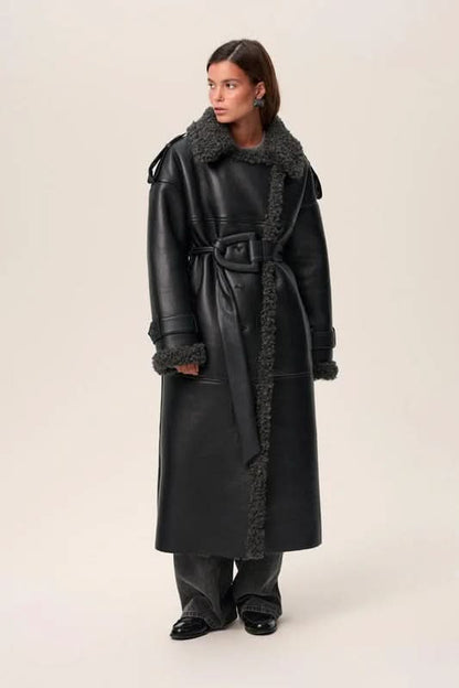 Black leather cropped coat with charcoal fleece collar and cuffs, three-quarter view