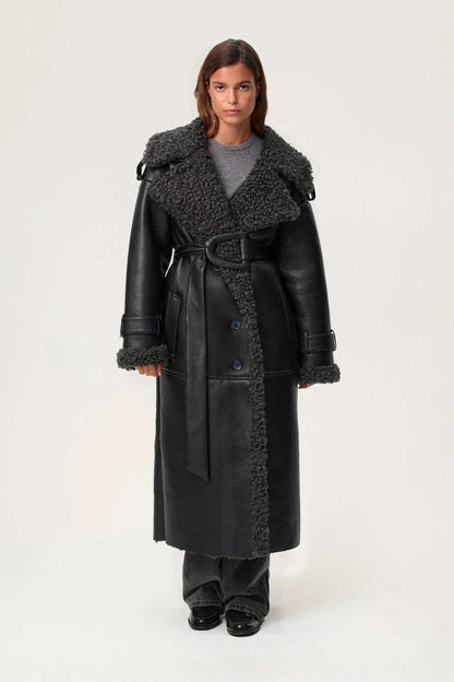 Black leather cropped coat with wide charcoal fleece collar and button front closure