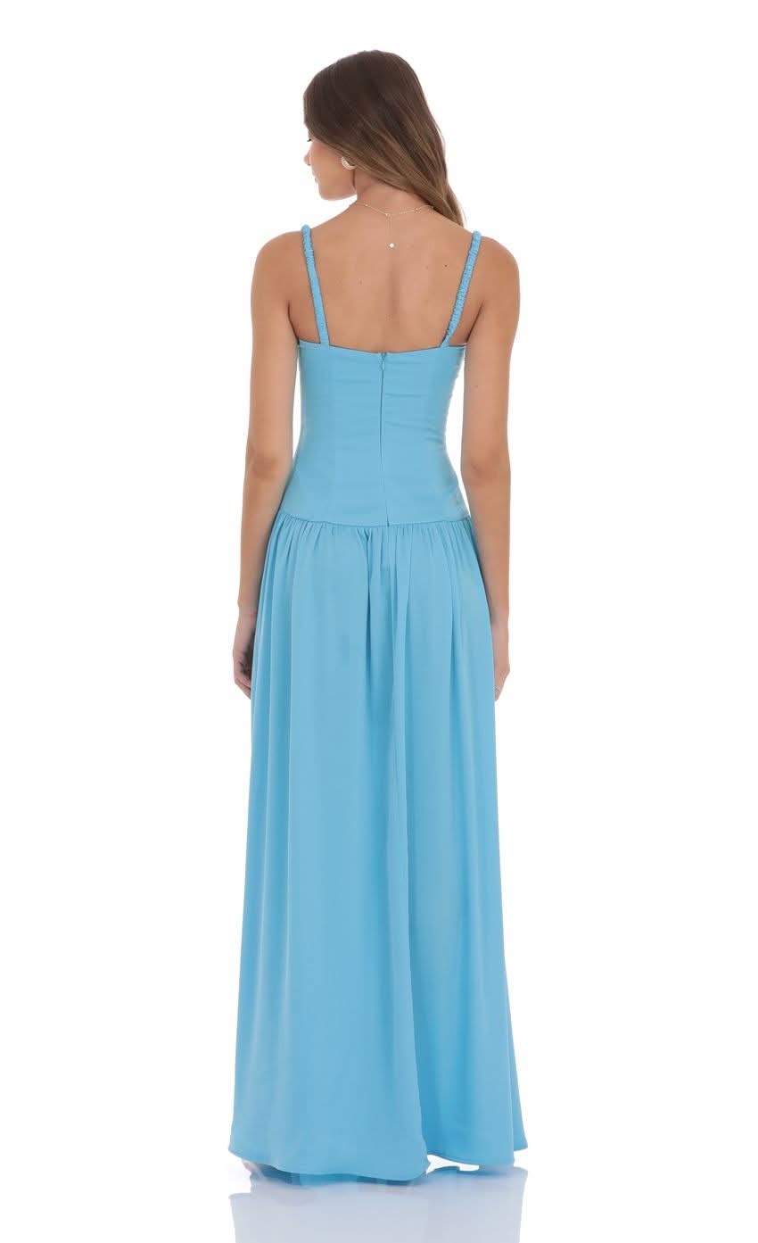 Back view of light blue maxi dress with thin straps and open back