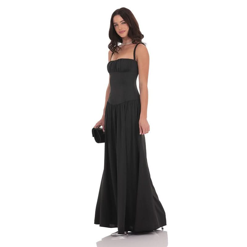 Black satin maxi dress with gathered bodice and long flowing skirt