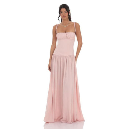 Blush pink satin maxi dress with ruched bodice and thin straps