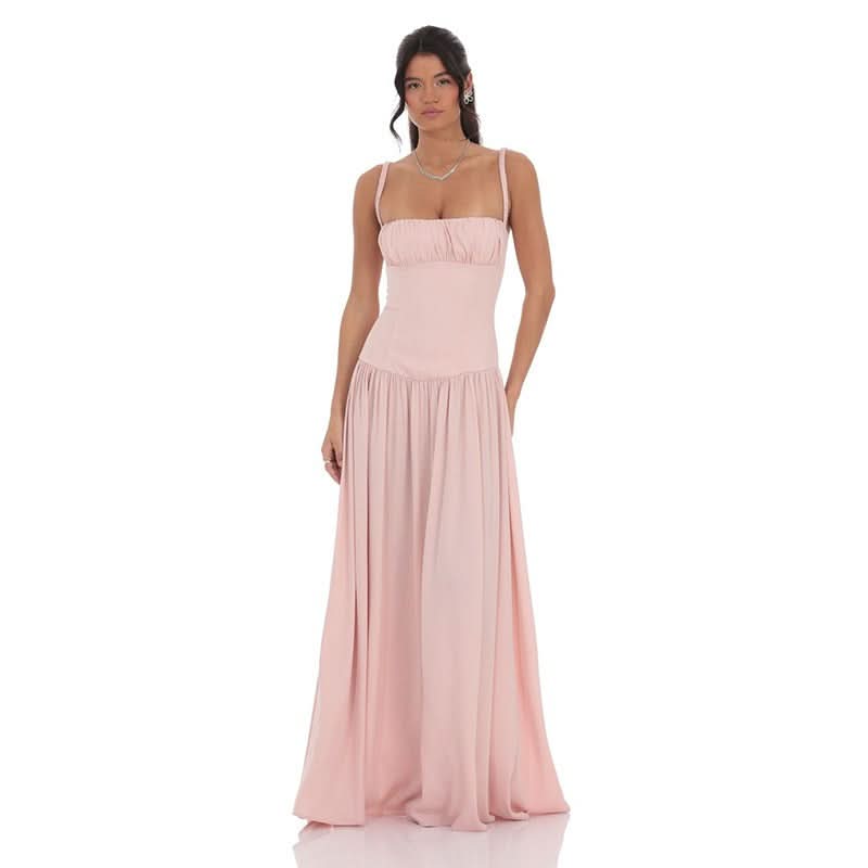 Blush pink satin maxi dress with ruched bodice and thin straps