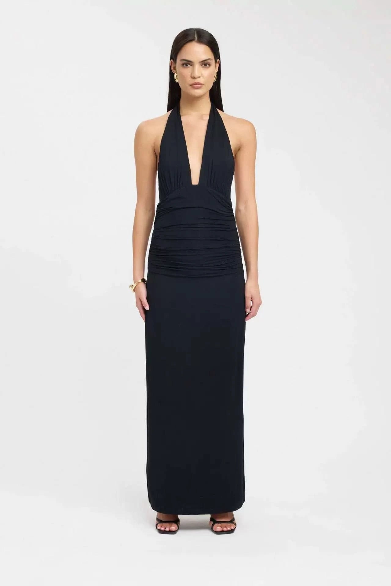 Black halter maxi dress with plunging neckline and gathered bodice
