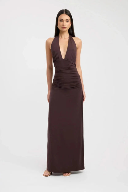 Brown halter maxi dress with deep V-neckline and ruched waist detail