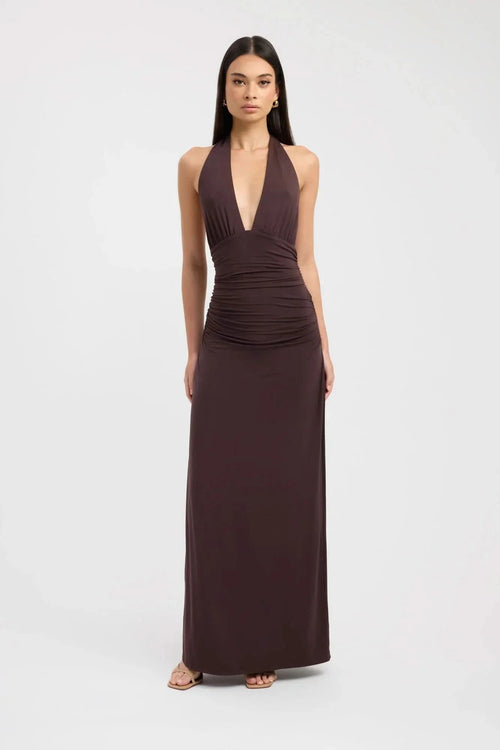 Brown halter maxi dress with deep V-neckline and ruched waist detail