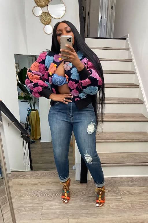 Multicolor puffed flower jacket featuring pink, blue, orange, and cream textured blooms
