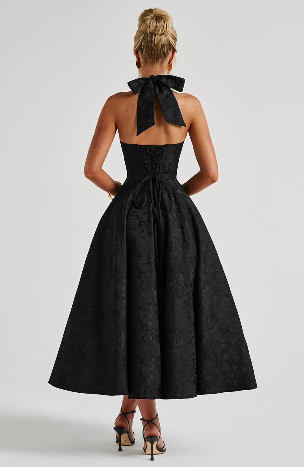 Black jacquard midi dress with halter neckline and full skirt back view